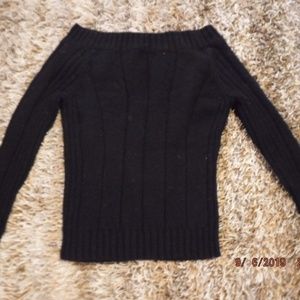 Black "fuzzy" long sleeved sweater,